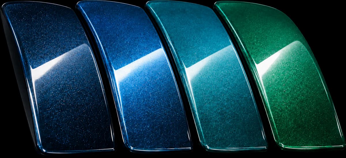 Four HALO sprayed colour reference panels from deep blue to teal